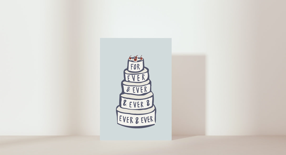 Stacked wedding cake with forever & ever & ever blue icing