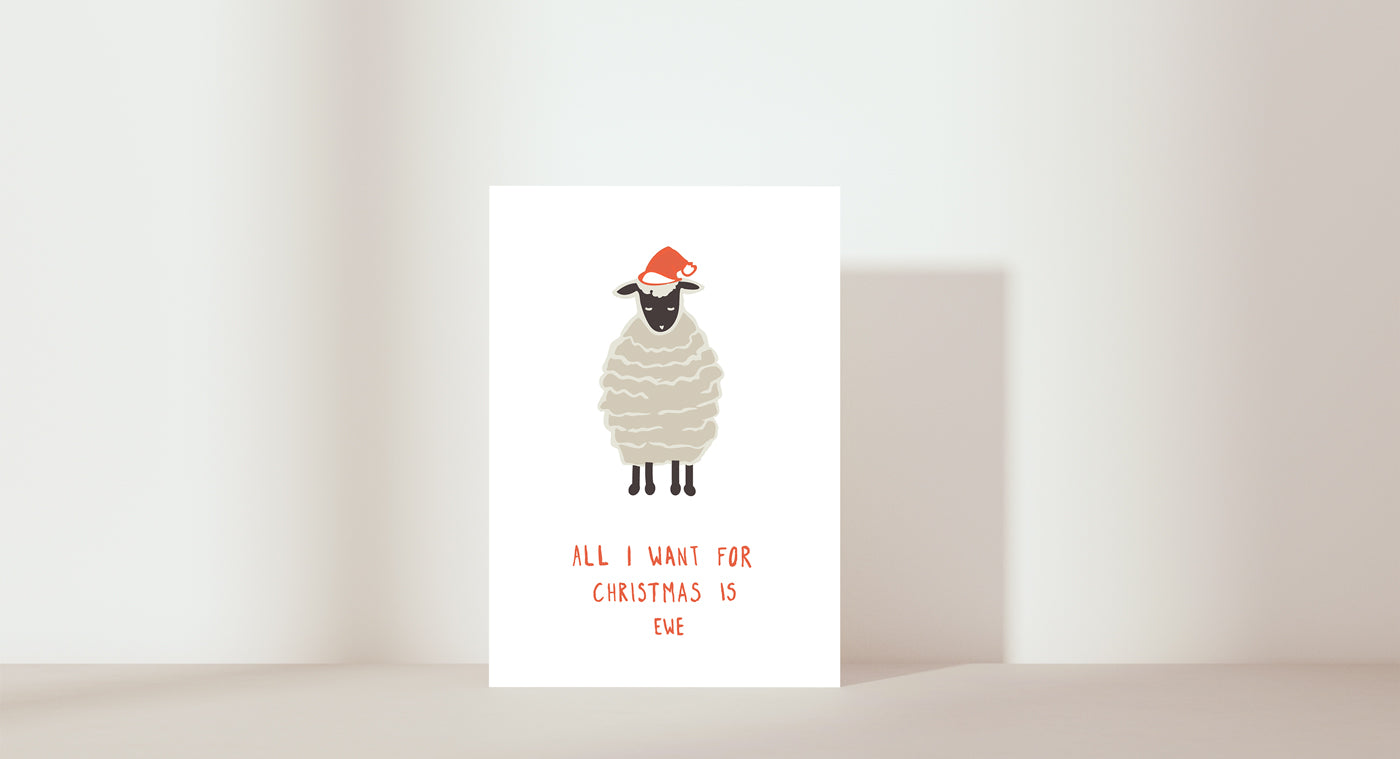 Sheep with a santa hat on