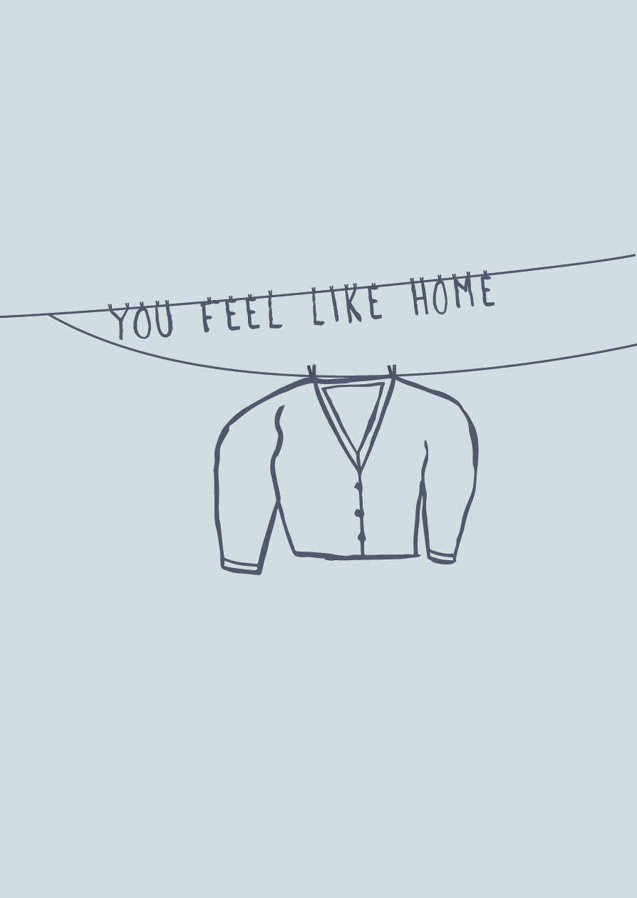 Illustration of jumper hanging on washing line. Text = You feel like home. colour = blue